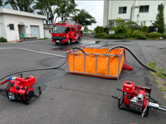 Photo: Relay formation training using portable pumps