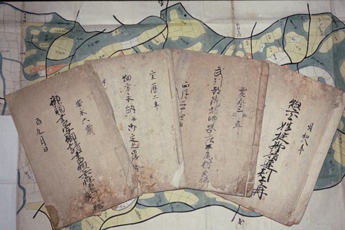 Photo: 4 volumes of Baba family's ancient documents