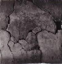Photo: Square tile engraved with an inscription